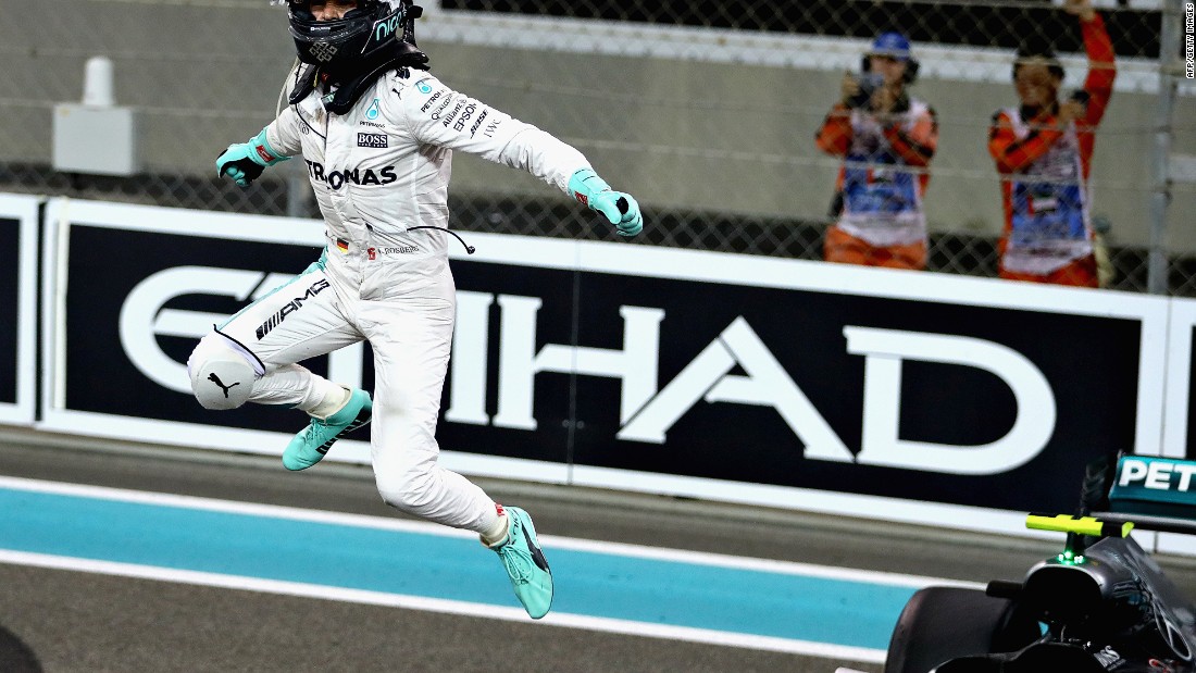 A jubilant Rosberg leaps from the cockpit after the race, having finished second behind Hamilton.