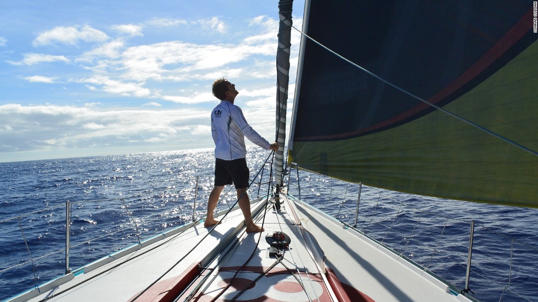 Colman takes a moment to check the trim of his yacht, which he describes as &quot;an ambassador for clean energy.&quot;