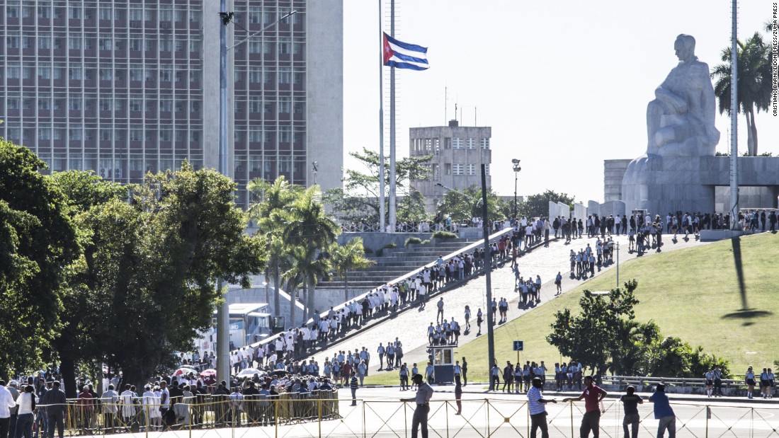 People gather at Revolution Square to pay tribute to Castro on Monday, November 28. 