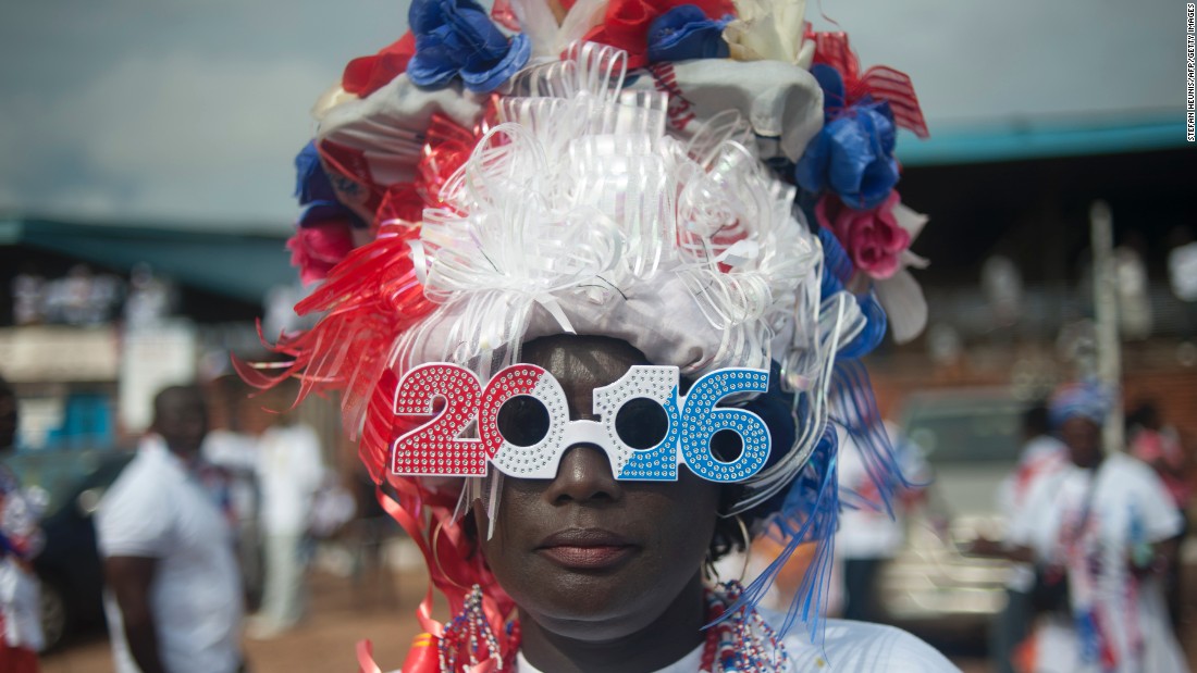 According to the electoral commission, Mahama won the 2012 election with 50.70 percent of the votes cast, compared to opposition candidate Nana Akufo-Addo&#39;s 47.74 percent.&lt;br /&gt;&lt;br /&gt;Picture here, a supporter of Ghana&#39;s largest opposition party New Patriotic Party (NPP) is seen at the party manifesto launch in Accra on October 9, 2016. Photo Stefan Heunis/AFP/Getty Images.