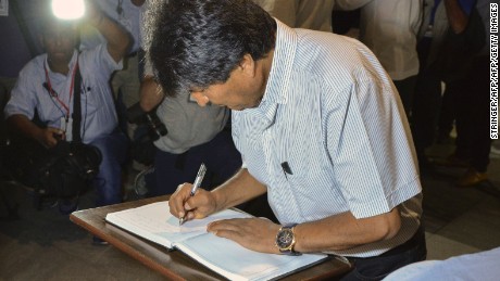 Bolivia's President Evo Morales signs the condolences book after paying his last respects to Cuban revolutionary icon Fidel Castro in Havana, on November 29, 2016. 
A titan of the 20th century who beat the odds to endure into the 21st, Castro died late Friday after surviving 11 US administrations and hundreds of assassination attempts. No cause of death was given. Castro's ashes will go on a four-day island-wide procession starting Wednesday before being buried in the southeastern city of Santiago de Cuba on December 4. / AFP / STRINGER        (Photo credit should read STRINGER/AFP/Getty Images)