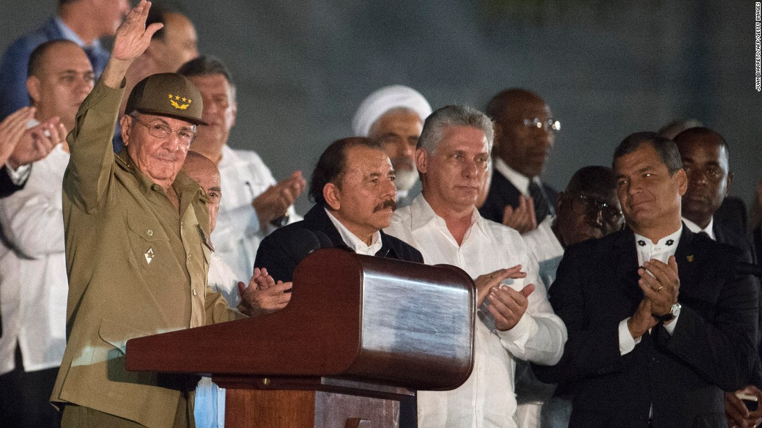 Cuban President Raul Castro, left, Nicaraguan President Daniel Ortega, center, and Ecuadorian President Rafael Correa, far right, take part in the Revolution Square rally on November 29. 