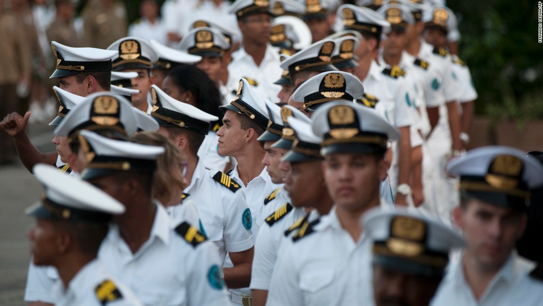 Navy cadets join the crowd during the rally on November 29. 