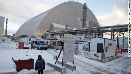 The new protective shield enclosing Chernobyl&#39;s damaged reactor was pushed into position Tuesday.   