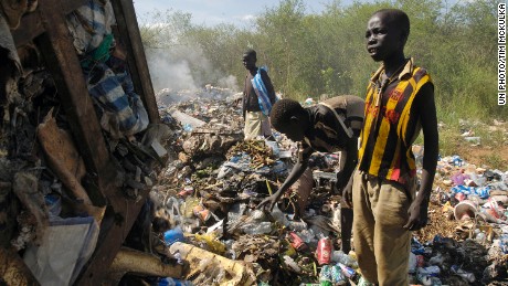 Children scavenge food and clothing from the Juba Municipal Garbage Dump.