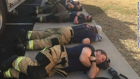 Firefighters from the Johnson City Professional Firefighters Association L-1791 rest after 36 hours of battling the fires around Gatlinburg.