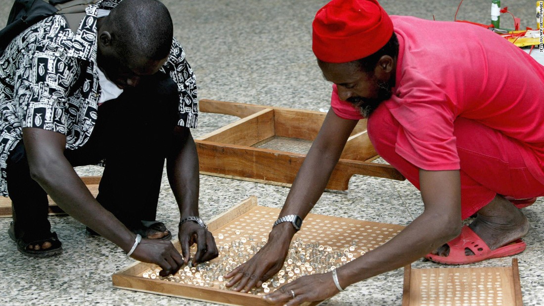 Counting is snappy as the marbles are poured from the ballot drum into a wooden tray with 200 or 500 holes.