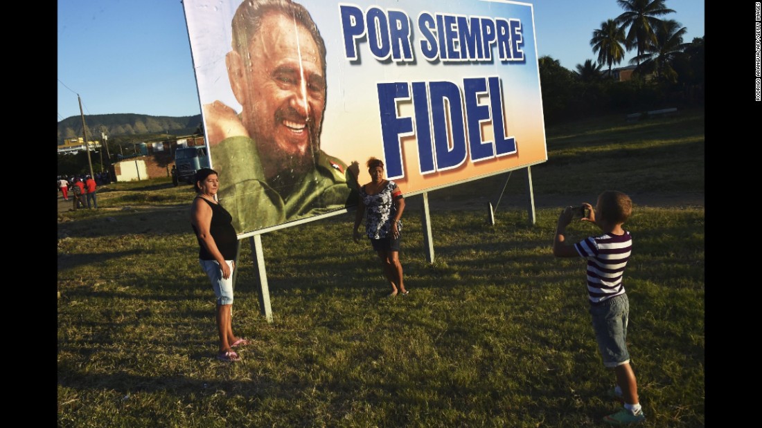 Cubans await for the passage of the urn containing the ashes of Fidel Castro on December 4. 