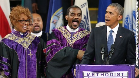 CHARLESTON, SC - JUNE 26:  U.S. President Barack Obama sings &quot;Amazing Grace&quot; as he delivers the eulogy for South Carolina state senator and Rev. Clementa Pinckney during Pinckney&#39;s funeral service June 26, 2015 in Charleston, South Carolina. Suspected shooter Dylann Roof, 21, is accused of killing nine people on June 17th during a prayer meeting in the church, which is one of the nation&#39;s oldest black churches in Charleston.  (Photo by Joe Raedle/Getty Images)