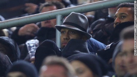 Aubameyang watches his team from the stands during the Champions League against Sporting.