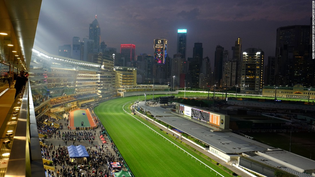 The Hong Kong skyline provided a stunning backdrop for the International Jockeys&#39; Championship at the Happy Valley racecourse.
