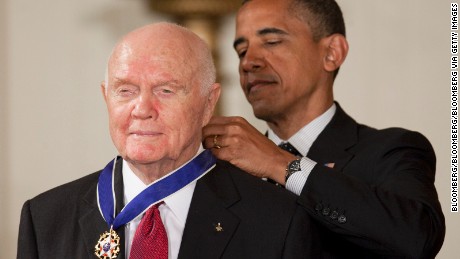 John Glenn, former Marine Corps pilot, astronaut and U.S. Senator, left, receives the Presidential Medal of Freedom from U.S. President Barack Obama at the White House in Washington, D.C., U.S., on Tuesday, May 29, 2012. The Medal of Freedom is the nation&#39;s highest civilian honor. Photographer: Andrew Harrer/Bloomberg via Getty Images 