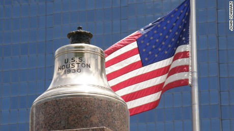 The original USS Houston CA-30 ship&#39;s bell was recovered by divers in the 1970s. It now sits atop the USS Houston CA-30 monument in downtown Houston, Texas.