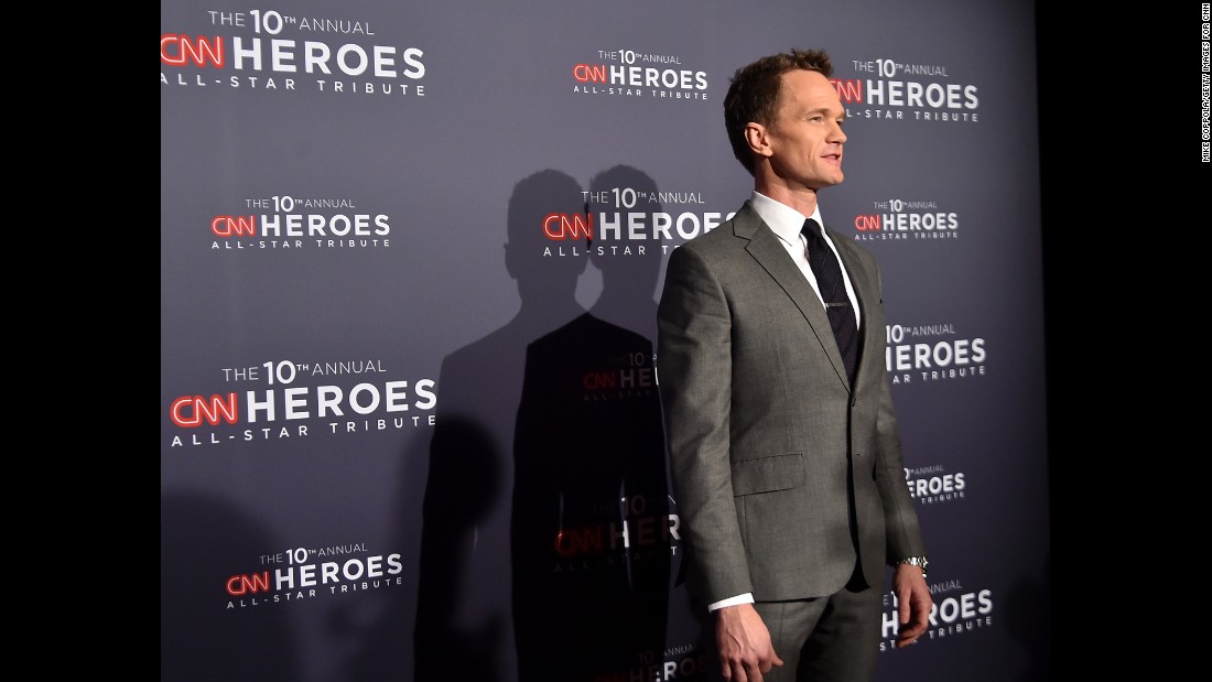 Actor Neil Patrick Harris poses for photos on the CNN Heroes red carpet.