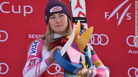 Mikaela Shiffrin celebrates on the podium after winning the women&#39;s slalom.