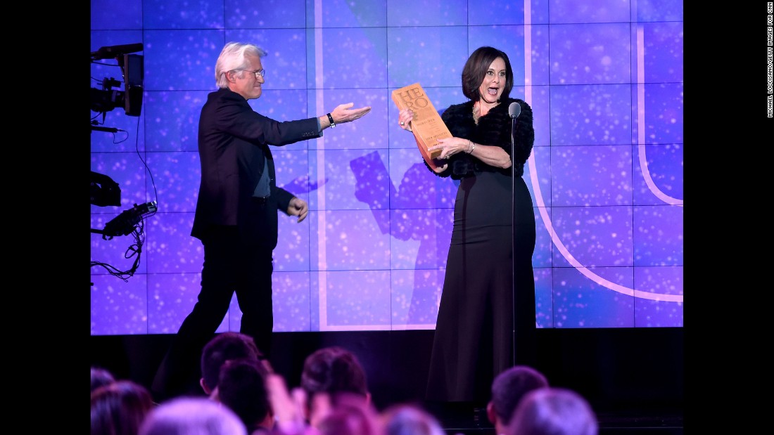 CNN Hero Georgie Smith of&lt;a href=&quot;http://www.cnn.com/2016/06/09/us/cnn-heroes-georgie-smith/index.html&quot; target=&quot;_blank&quot;&gt; A Sense Of Home&lt;/a&gt; accepts her award from presenter Richard Gere. Smith helps former foster kids establish a home all their own after they age out of the Los Angeles foster care system.