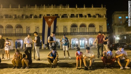 Public Wi-Fi spots, such as this one in 2016 outside the Santa Isabel Hotel in Havana, have become popular gathering places. 