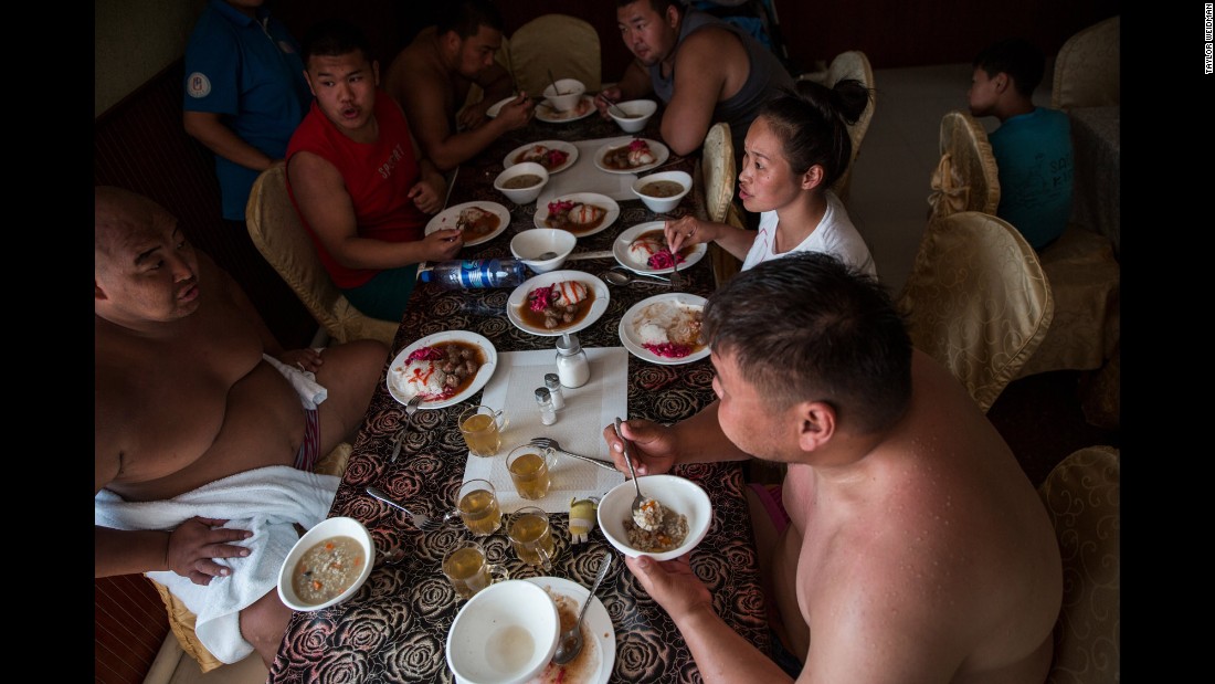 Wrestlers eat lunch together at the training camp. &quot;Wrestlers would eat big meals with lots of mutton and rice,&quot; Weidman said. &quot;Traditionally, I think sumo wrestlers are supposed to have two huge meals a day, followed by naps so the calories aren&#39;t burned off right away.&quot;