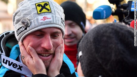 Austria&#39;s Max Franz is congratulated by his girlfriend after winning the downhill at Val Gardena.