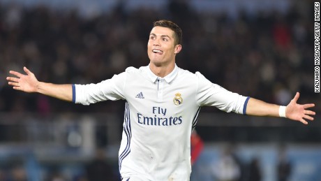 Real Madrid&#39;s Cristiano Ronaldo celebrates as his hat-trick helped Real Madrid to a 4-2 win over Kashima Antlers in the Club World Cup final