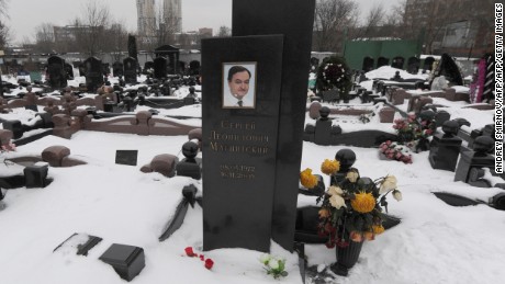 Pictured: The tombstone of Sergei Magnitsky in Moscow. The Russian lawyer uncovered the largest tax fraud in the country&#39;s history. He died in 2009 after a year in a Moscow detention center, apparently beaten to death.