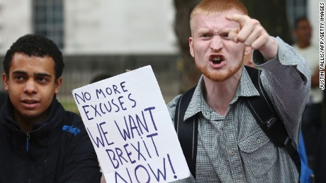 A man carries an anti-EU sign at a counterprotest  in central London on September 3, 2016.