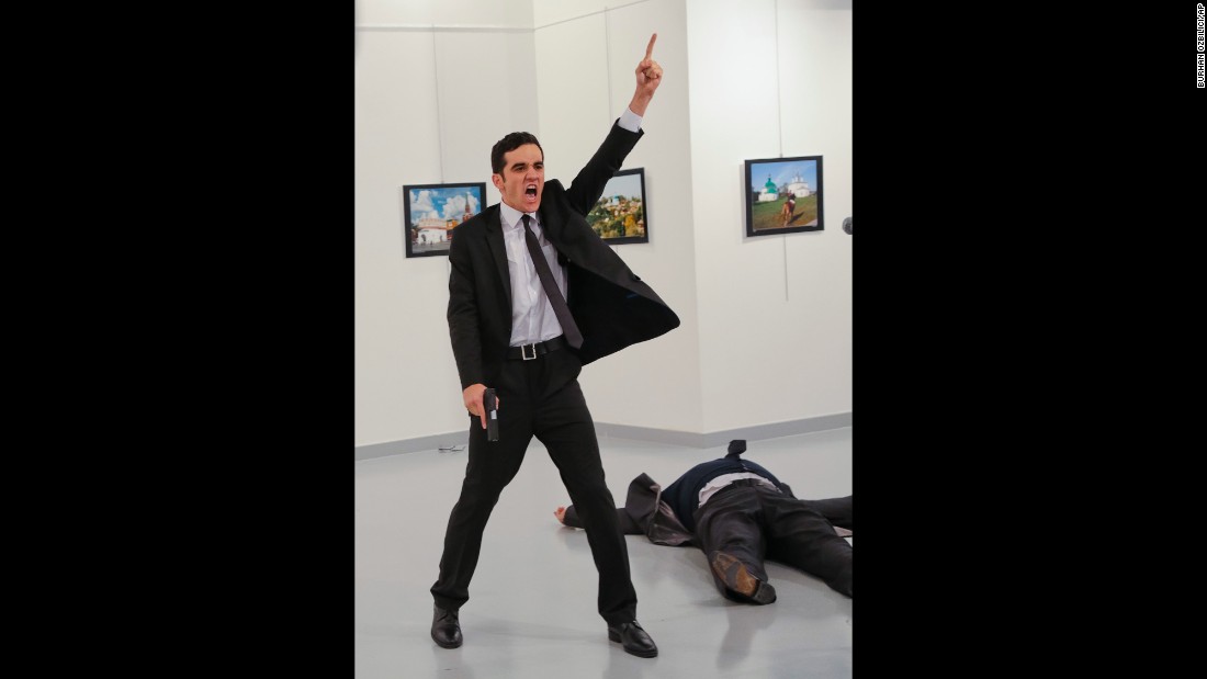 The gunman gestures near the body of Karlov. In a video circulating on social media, the shooter is heard shouting, &quot;Allahu akbar (God is greatest). Do not forget Aleppo! Do not forget Syria! Do not forget Aleppo! Do not forget Syria!&quot; Russia has been instrumental in helping Syrian President Bashar al-Assad&#39;s regime in its push to retake the eastern sector of Aleppo, which had been held by rebels for nearly four years. Russia is also the most powerful ally of Assad&#39;s regime and has carried out airstrikes since September 2015 to prop up the embattled leader.