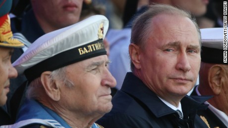 Russian President Vladimir Putin attends a n even during Navy Day on July 26, 2015, in the militarized garrison town of Bailtiysk, Russia.