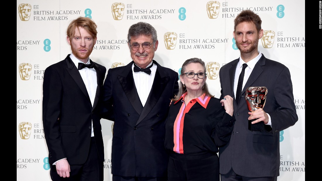 Domhnall Gleeson, left, Hugo Sigman, Fisher, and Damian Szifron pose for a photo at the EE British Academy Film Awards in London on February 14, 2016. Their film, &quot;Wild Tales,&quot; won the BAFTA Award for best film not in the English language.