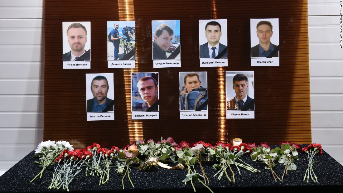 Photographs of Channel One, NTV and Zvezda TV journalists killed in the plane crash are seen outside the Ostankino Technical Center in Moscow.