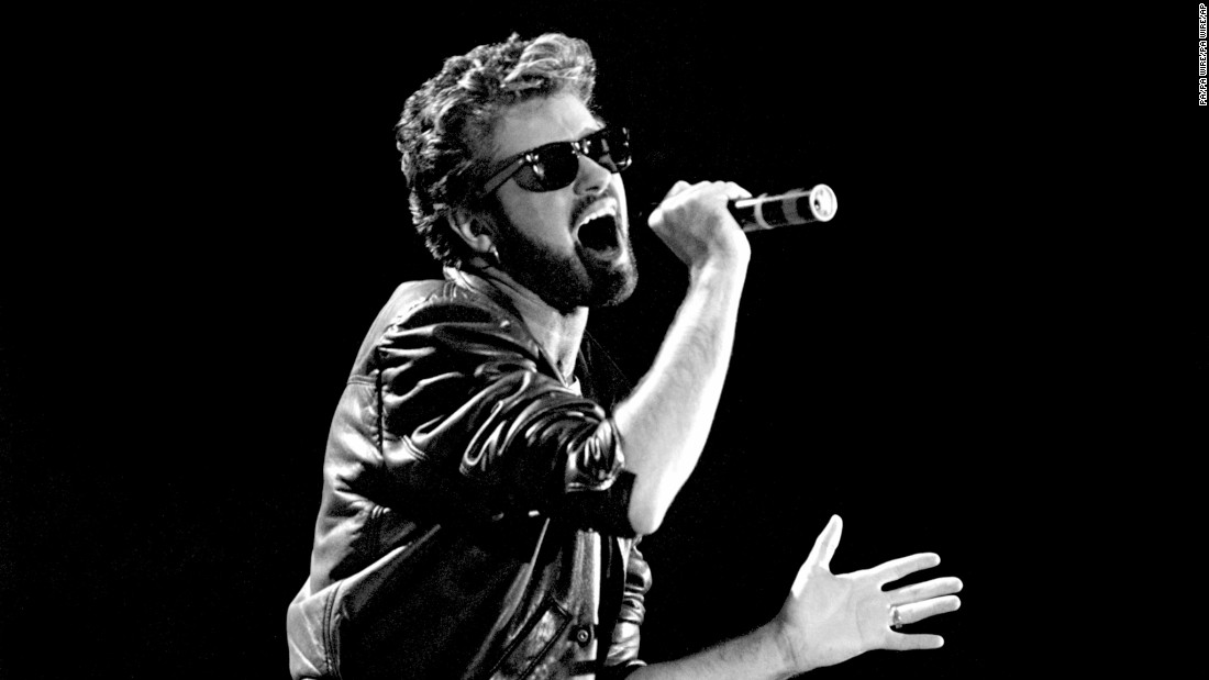 George Michael of Wham! performs at the Live Aid concert in London in 1985.