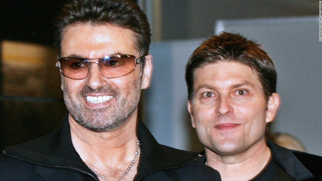 George Michael, left, with his partner Kenny Goss at a reception after the Japan premiere of his autobiographical movie &quot;George Michael: A Different Story,&quot; in December 2005. In 1998, Michael told CNN in an exclusive interview that he was gay.