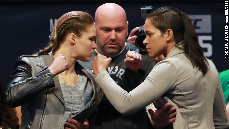 UFC women&#39;s bantamweight champ Amanda Nunes faces off with Ronda Rousey at their November 11 weigh-ins.