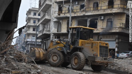 The Syrian government starts to clean up areas formerly held by opposition forces in Aleppo on December 27, 2016.