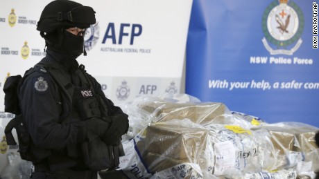 A police officer guards a haul of drugs that are on display at an Australian Federal Police office in Sydney, Australia, Thursday, Dec. 29, 2016. Officials have seized more than a ton of cocaine worth about 360 million Australian dollars ($260 million) in what police have dubbed one of the largest drug busts in the nation&#39;s history. (AP Photo/Rick Rycroft)