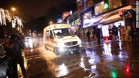 An ambulance rushes from the scene of an attack in Istanbul, early Sunday, Jan. 1, 2017. Turkey&#39;s state-run news agency said an armed assailant has opened fire at a nightclub in Istanbul during New Year&#39;s celebrations. (AP Photo/Halit Onur Sandal)