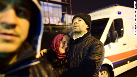 People react at the site of an armed attack January 1, 2017 in Istanbul.
At least two people were killed in an armed attack Saturday on an Istanbul nightclub where people were celebrating the New Year, Turkish television reports said. / AFP / YASIN AKGUL        (Photo credit should read YASIN AKGUL/AFP/Getty Images)