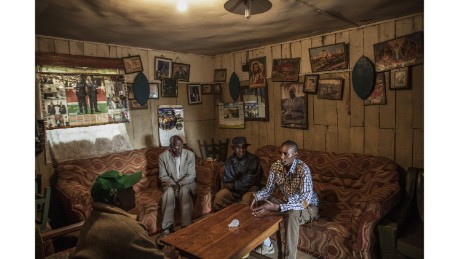 Muiruri talks with his grandfather and uncles. The family &quot;had to defend and protect Ryan from the community.&quot;