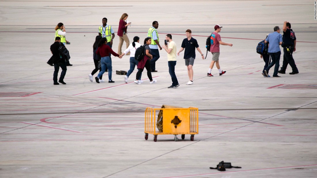 Officials said it&#39;s too early in the investigation to know for certain what prompted a man to open fire on people at the baggage claim area in Terminal 2.