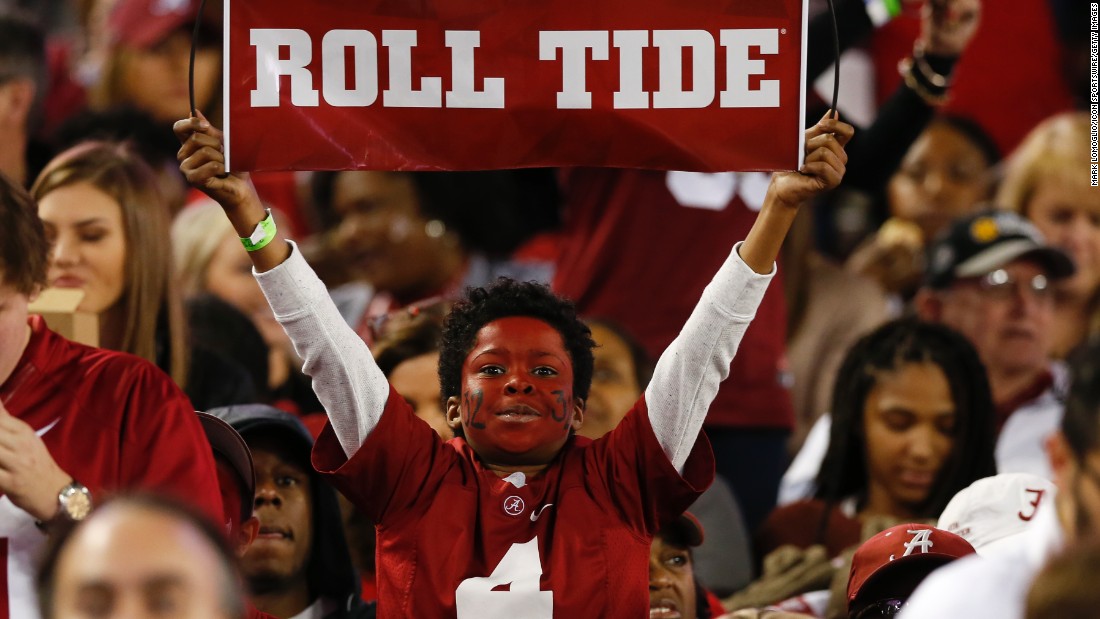 A young Alabama fan shows his support for the Crimson Tide.