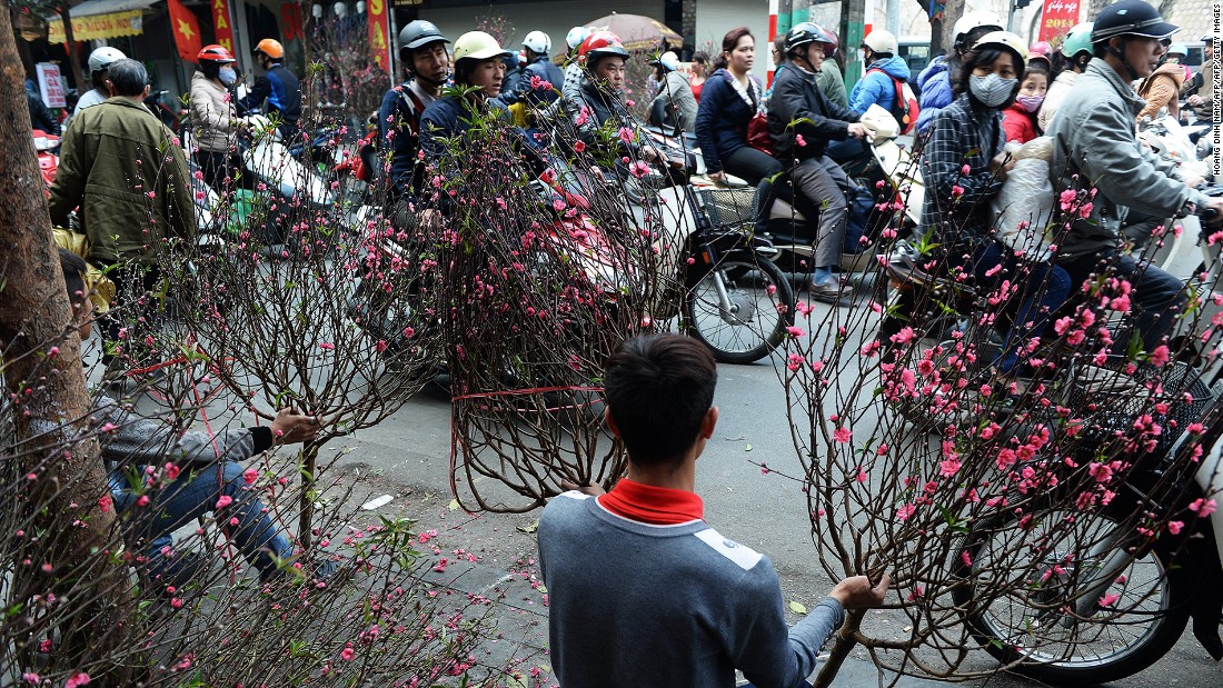 &lt;strong&gt;Hanoi, Vietnam -- Tet flower market: &lt;/strong&gt;Known as Tet in Vietnam, Lunar New Year is the most important holiday in the country. Dodging motorcyclists while visiting a local flower market is part of the fun of celebrating the festival in Hanoi.