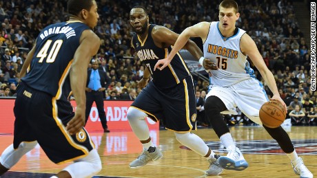Denver forward Nikola Jokic leads the attack against the Pacers.