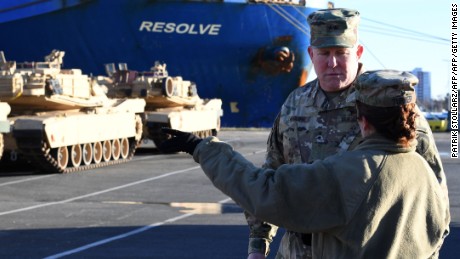 Maj. Gen. Timothy McGuire, deputy commander of US miltary in Europe, supervises the unloading of US military vehicles from a transport ship in the harbor in Bremerhaven, northwestern Germany.