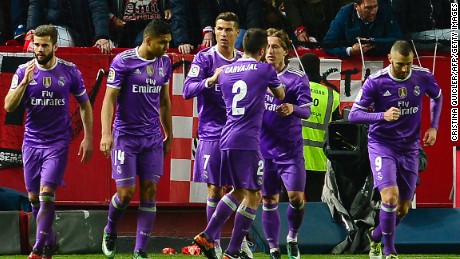 Real Madrid&#39;s Cristiano Ronaldo (3rdL) celebrates after putting his side ahead against Sevilla.