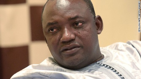 Gambian president-elect Adama Barrow speaks during an interview in Banjul on December 12, 2016. 
Adama Barrow said on December 12 that longtime leader Yahya Jammeh should step down immediately after Jammeh reversed his decision to concede defeat following a presidential election. &quot;I think he should step down now,&quot; Barrow told AFP. &quot;He has lost the election, we don&#39;t want to waste time, we want this country to start moving.&quot;
 / AFP / SEYLLOU        (Photo credit should read SEYLLOU/AFP/Getty Images)