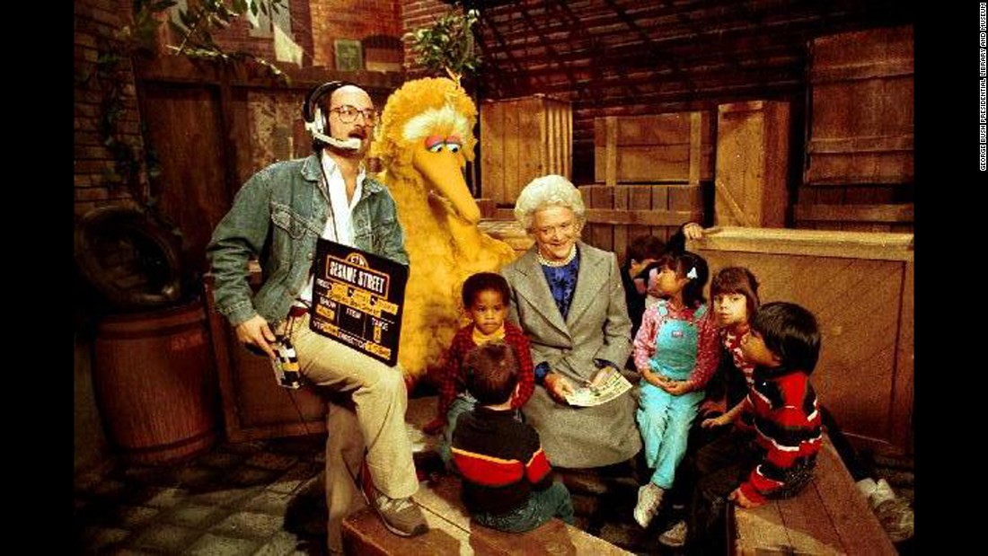 Bush reads to children and Big Bird on the set of &quot;Sesame Street&quot; in October 1989.