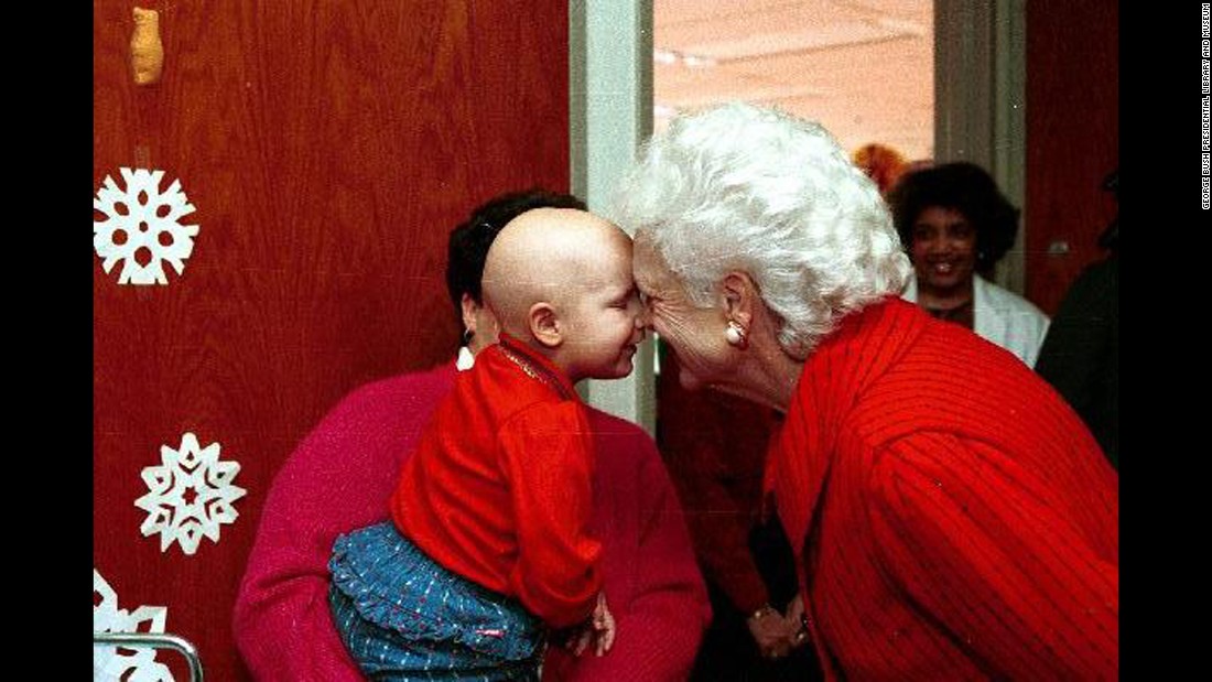 Bush visits a children&#39;s hospital during Christmas celebrations in Washington on December 6, 1990.