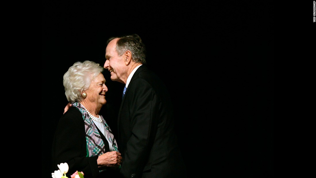 The former President embraces his wife after she introduced him at a Mother&#39;s Day Luncheon in Dallas on May 3, 2006.