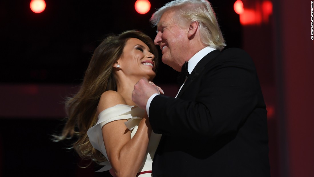 The first lady dances with her husband at an inaugural ball.
