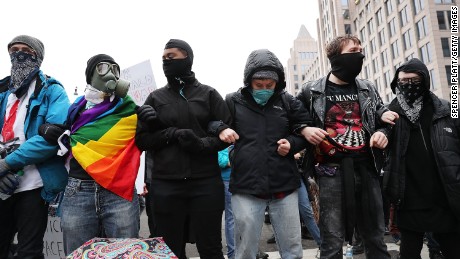 Police and demonstrators clash in downtown Washington, on January 20, 2017, following the inauguration of President Donald Trump.